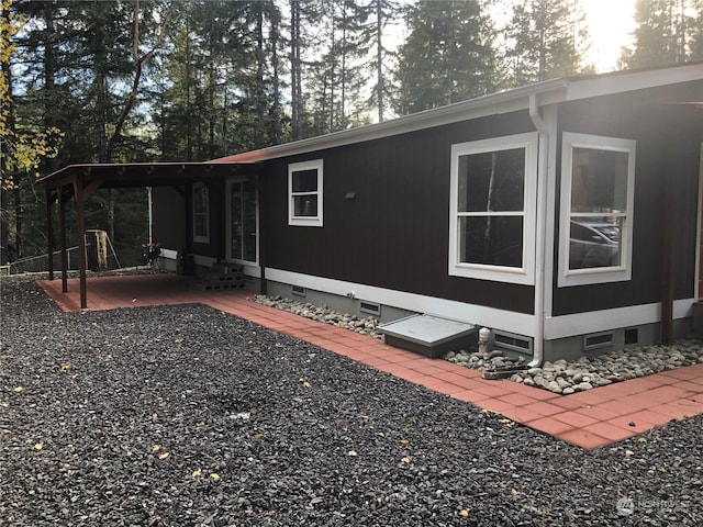 view of home's exterior featuring a patio