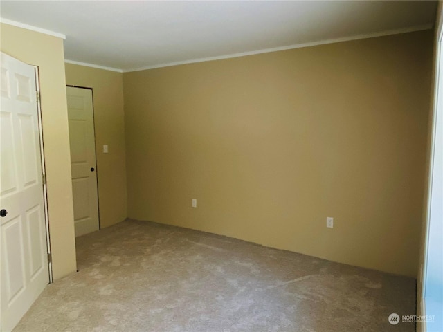 1769 SW Bay St, Port Orchard, WA 98366 - spare room with light carpet and crown molding