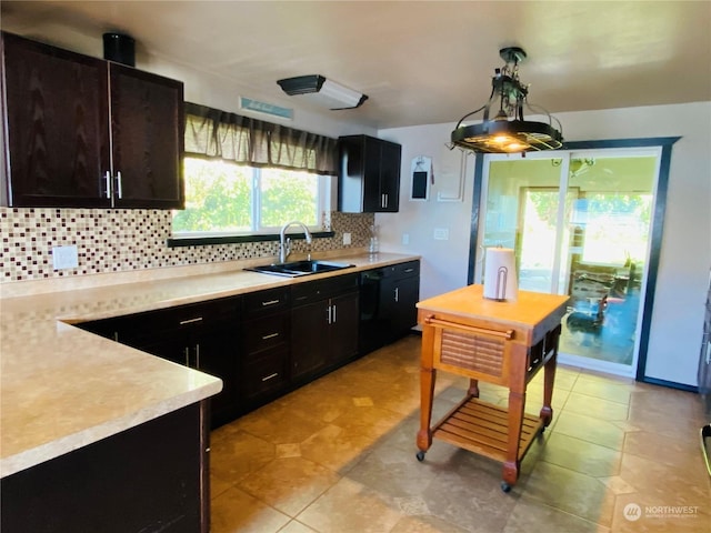 1769 SW Bay St, Port Orchard, WA 98366 - kitchen featuring a sink, light countertops, decorative backsplash, and light tile patterned flooring