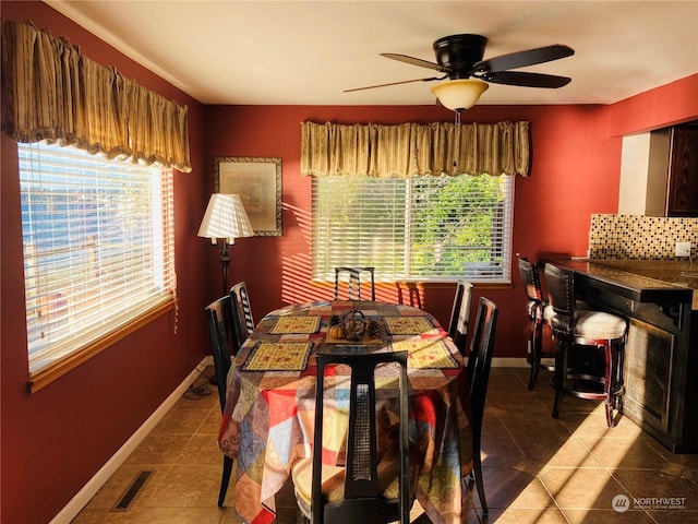 1769 SW Bay St, Port Orchard, WA 98366 - dining room with plenty of natural light, tile patterned floors, and a ceiling fan
