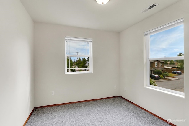 view of carpeted spare room