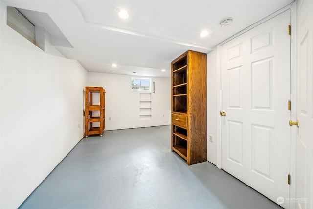 interior space featuring concrete flooring