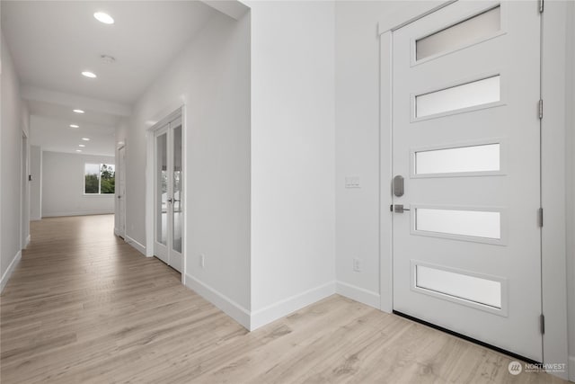 foyer entrance featuring light hardwood / wood-style floors