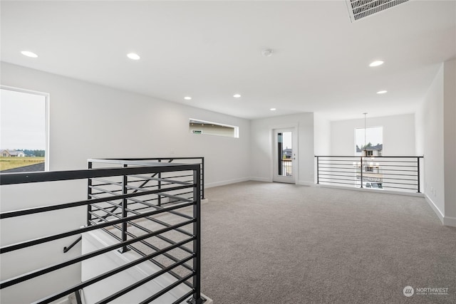 unfurnished room featuring carpet floors