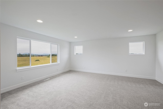 view of carpeted spare room