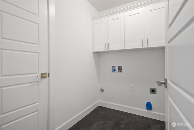 washroom featuring cabinets, washer hookup, and electric dryer hookup