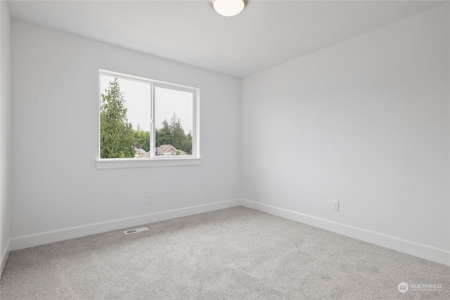 view of carpeted spare room