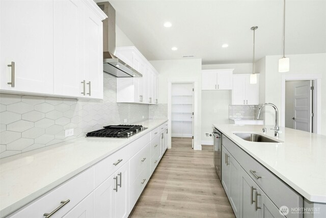 6202 229th Ave E, Buckley, WA 98321 - kitchen with wall chimney exhaust hood, appliances with stainless steel finishes, light countertops, tasteful backsplash, and recessed lighting