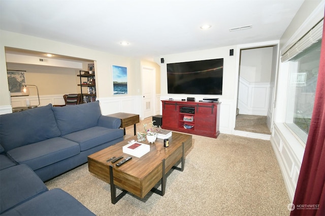 living room with light colored carpet