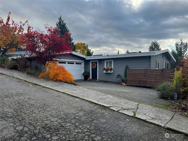 view of front of property featuring a garage