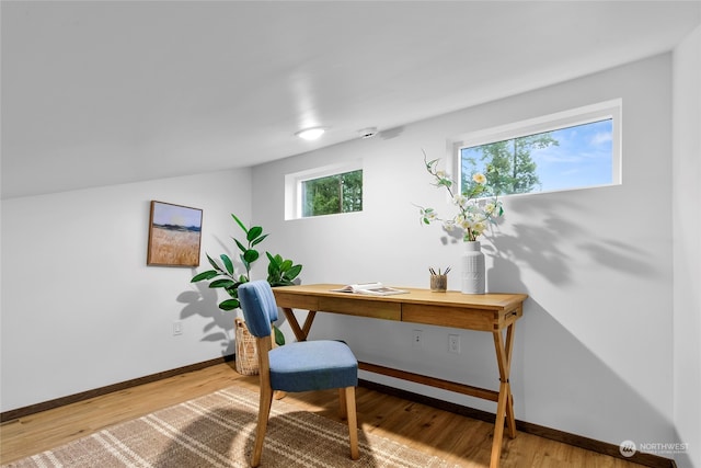 office area with wood-type flooring