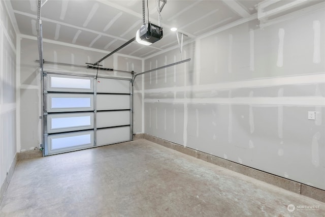 garage featuring a garage door opener