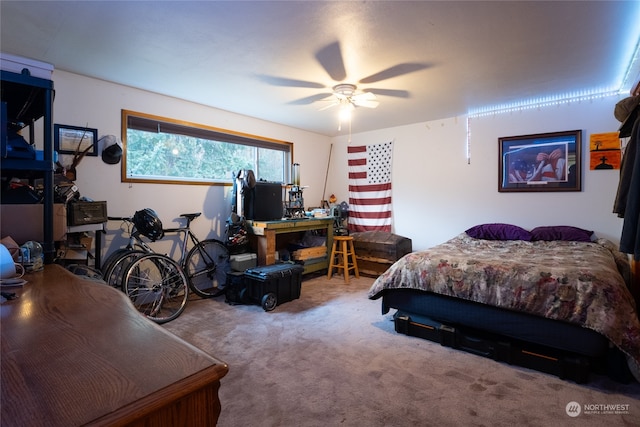 carpeted bedroom with ceiling fan