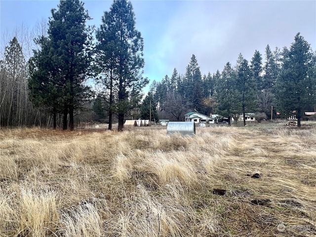 view of landscape with a rural view