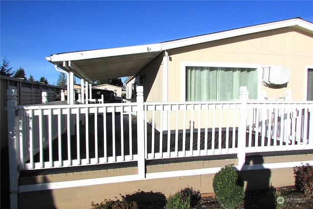 view of home's exterior featuring a deck