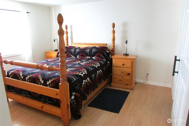 bedroom with light hardwood / wood-style floors