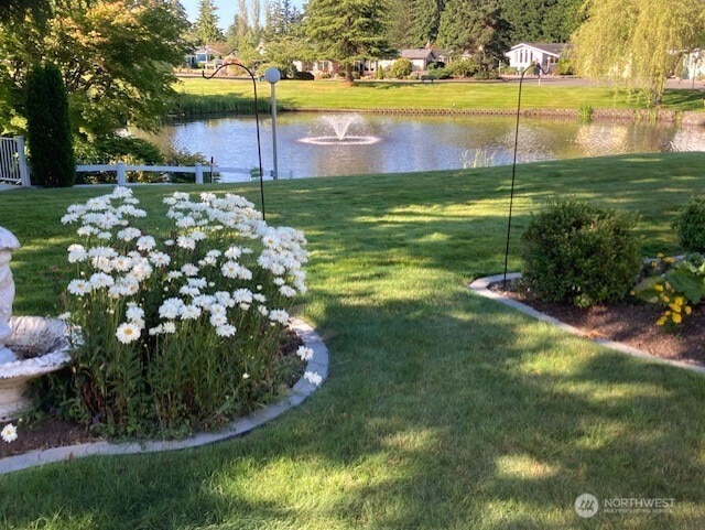 view of yard with a water view