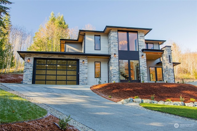 modern home featuring a garage