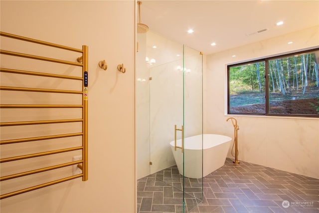 bathroom featuring a bathing tub