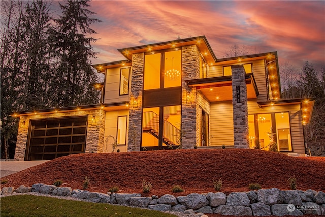 view of front of property with a garage