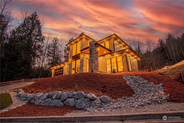 view of property exterior at dusk