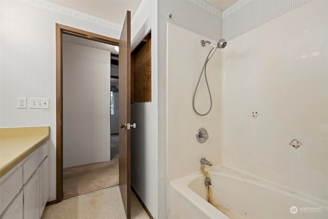 bathroom with vanity and bathing tub / shower combination