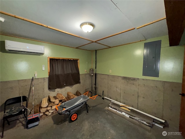 basement with electric panel and a wall unit AC