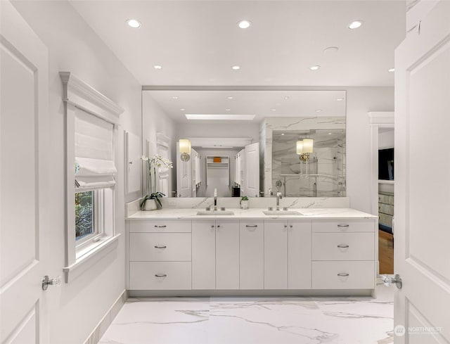 bathroom with vanity and an enclosed shower