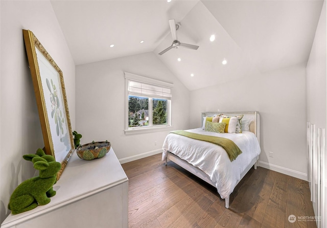 bedroom featuring dark hardwood / wood-style floors, ceiling fan, and lofted ceiling