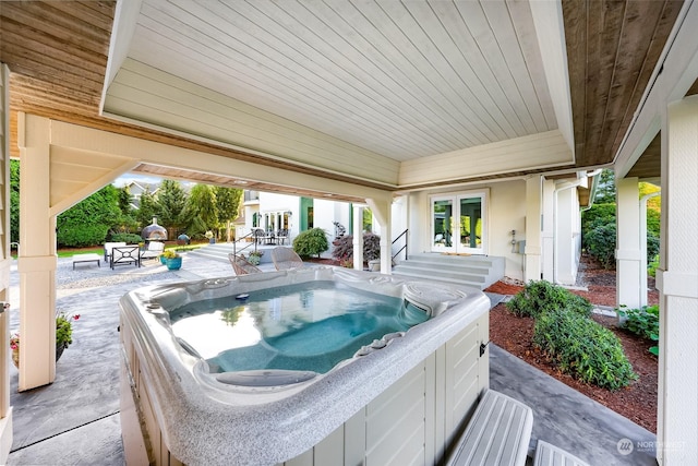 view of patio featuring a hot tub