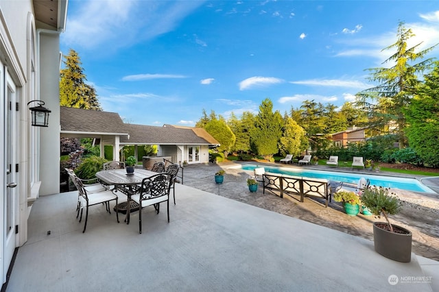 view of patio featuring a fenced in pool