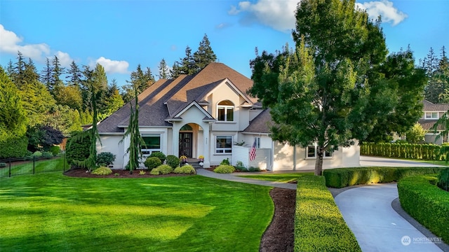 view of front facade featuring a front yard