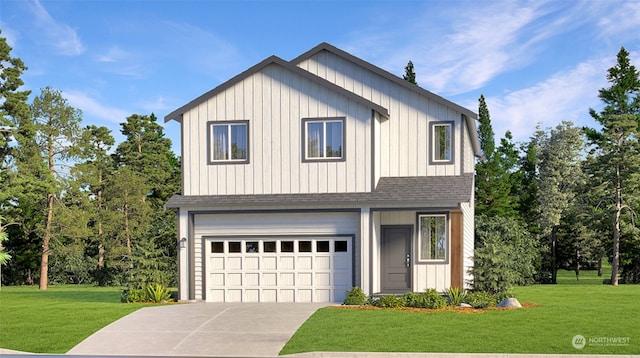 view of property with a front yard and a garage