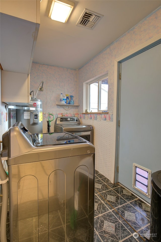 kitchen featuring washer and clothes dryer