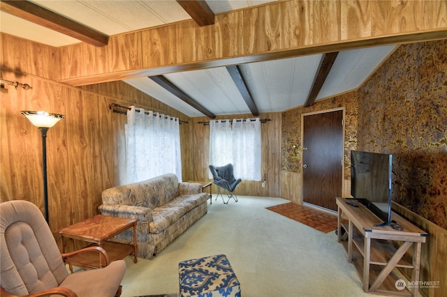 living room featuring carpet, vaulted ceiling with beams, and wooden walls