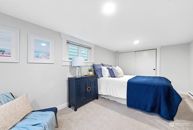 carpeted bedroom with a closet