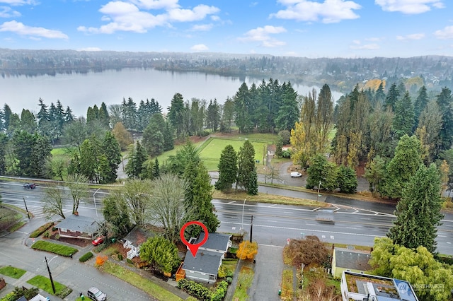 birds eye view of property featuring a water view