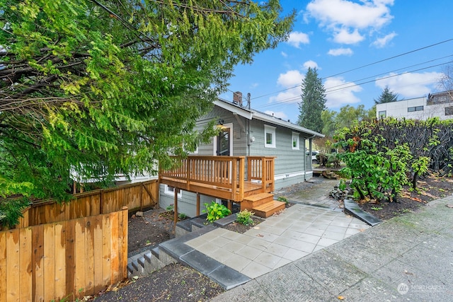 exterior space with a wooden deck