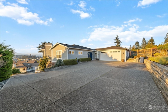 single story home featuring a garage