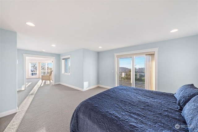 bedroom featuring carpet and access to outside