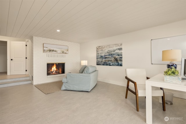 home office with a fireplace and wooden ceiling