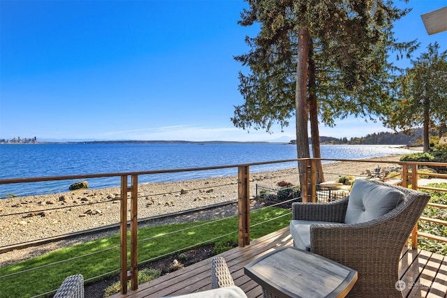 balcony featuring a water view