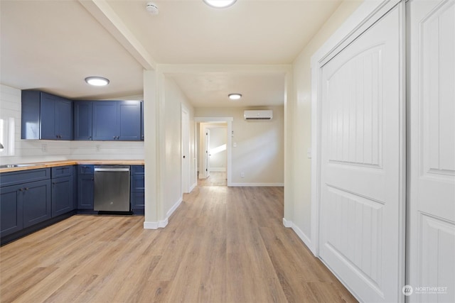 603 Military St, Walla Walla, WA 99362 - kitchen featuring butcher block counters, dishwasher, a wall mounted air conditioner, light hardwood / wood-style flooring, and decorative backsplash