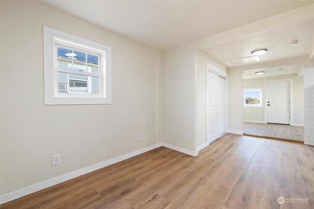 603 Military St, Walla Walla, WA 99362 - spare room featuring light hardwood / wood-style floors and a wealth of natural light