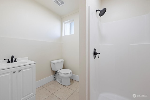 603 Military St, Walla Walla, WA 99362 - bathroom with tile patterned floors, vanity, toilet, and a shower