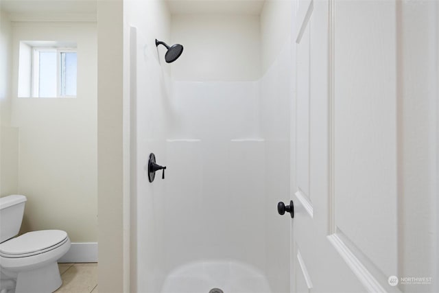 603 Military St, Walla Walla, WA 99362 - bathroom with tile patterned floors, toilet, and a shower
