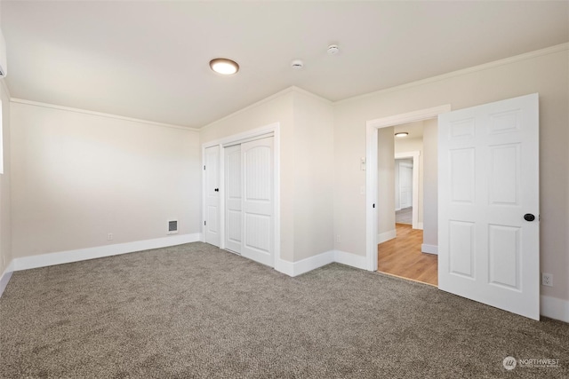 603 Military St, Walla Walla, WA 99362 - unfurnished bedroom with carpet, ornamental molding, and a closet