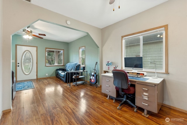 office with ceiling fan and hardwood / wood-style flooring