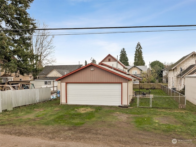 garage with a lawn