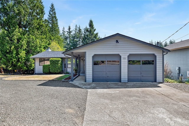 single story home featuring a garage